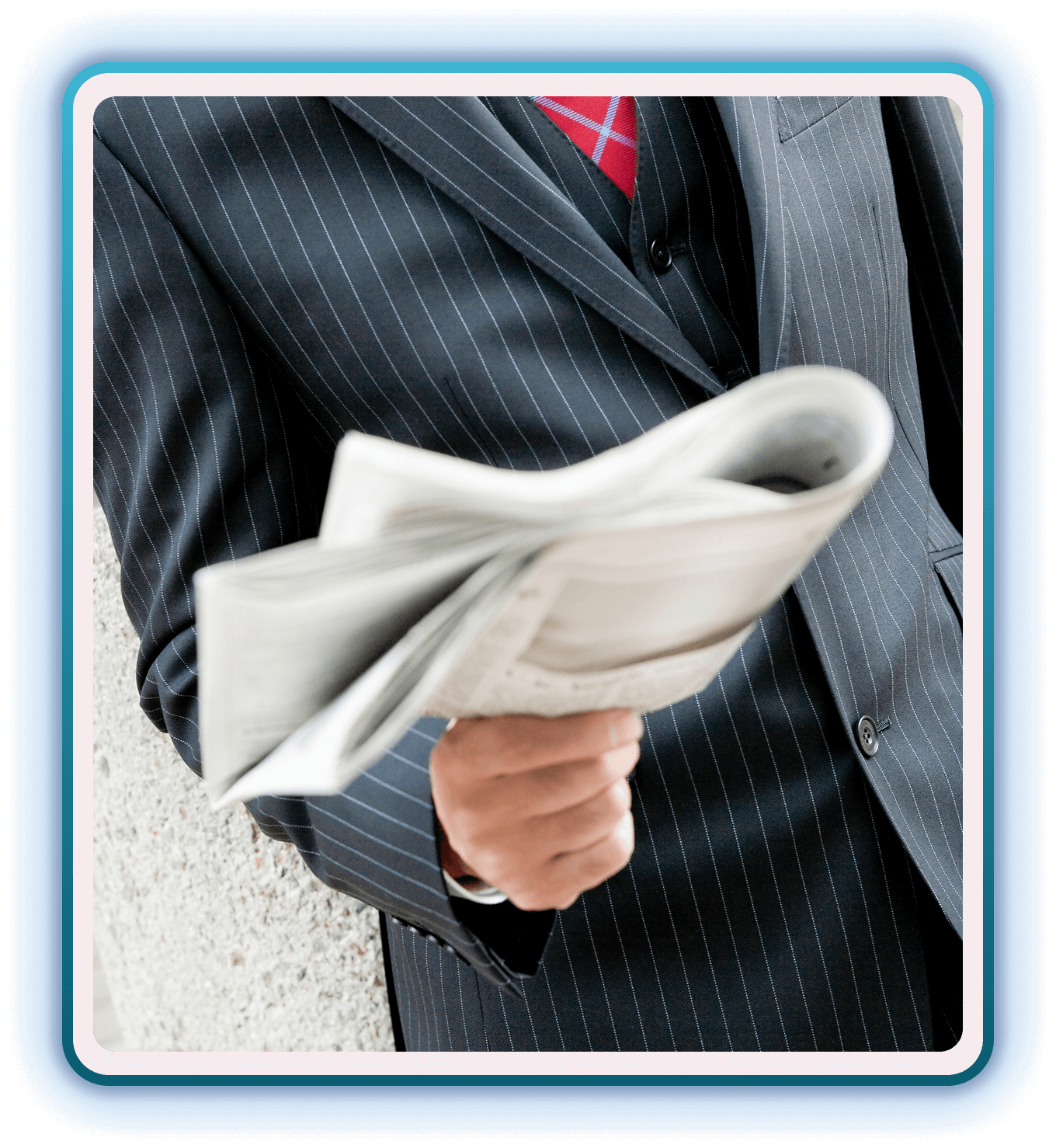 Businessman reading news in pinstripe suit