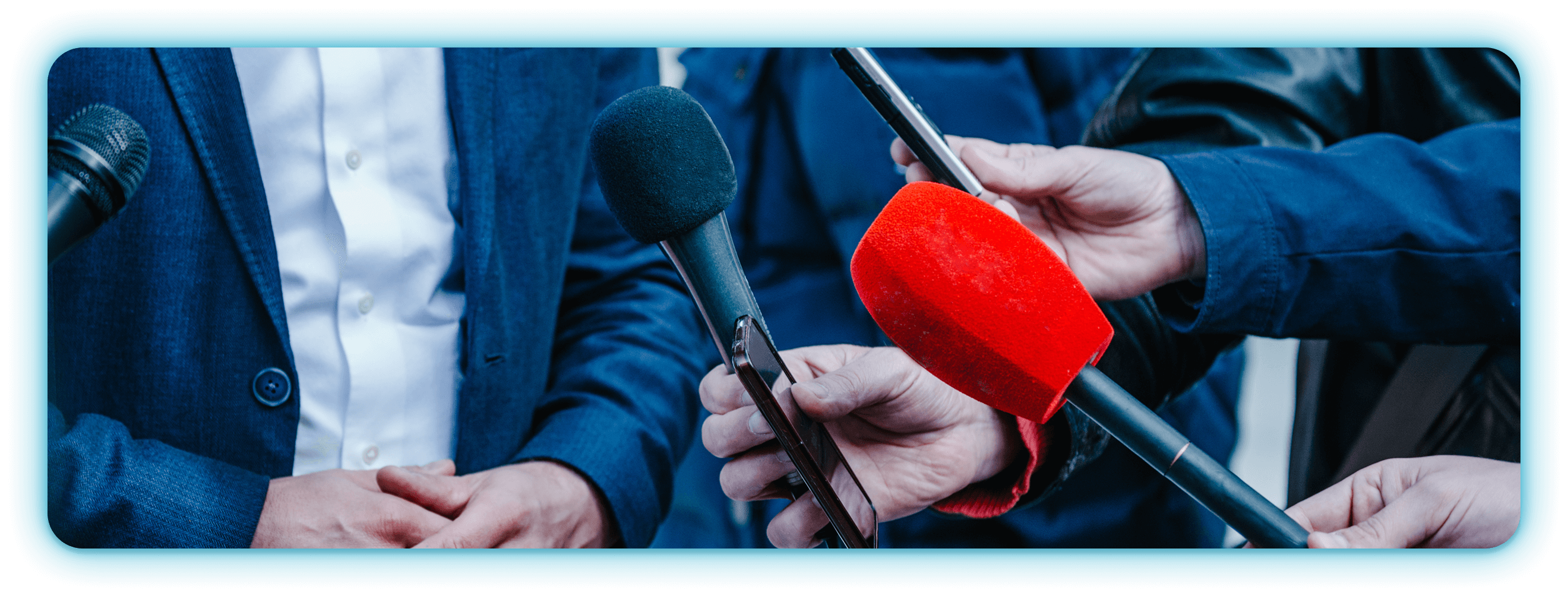 Journalist interviewing person with microphones